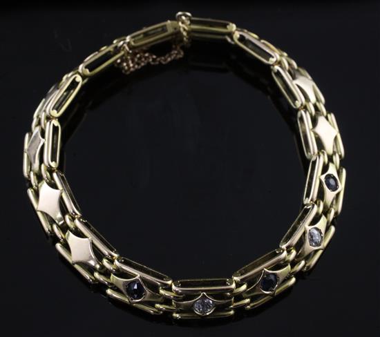 An early 20th century Russian 56 zolotnik (14ct) gold, diamond and sapphire gatelink bracelet, gross 20 grams.